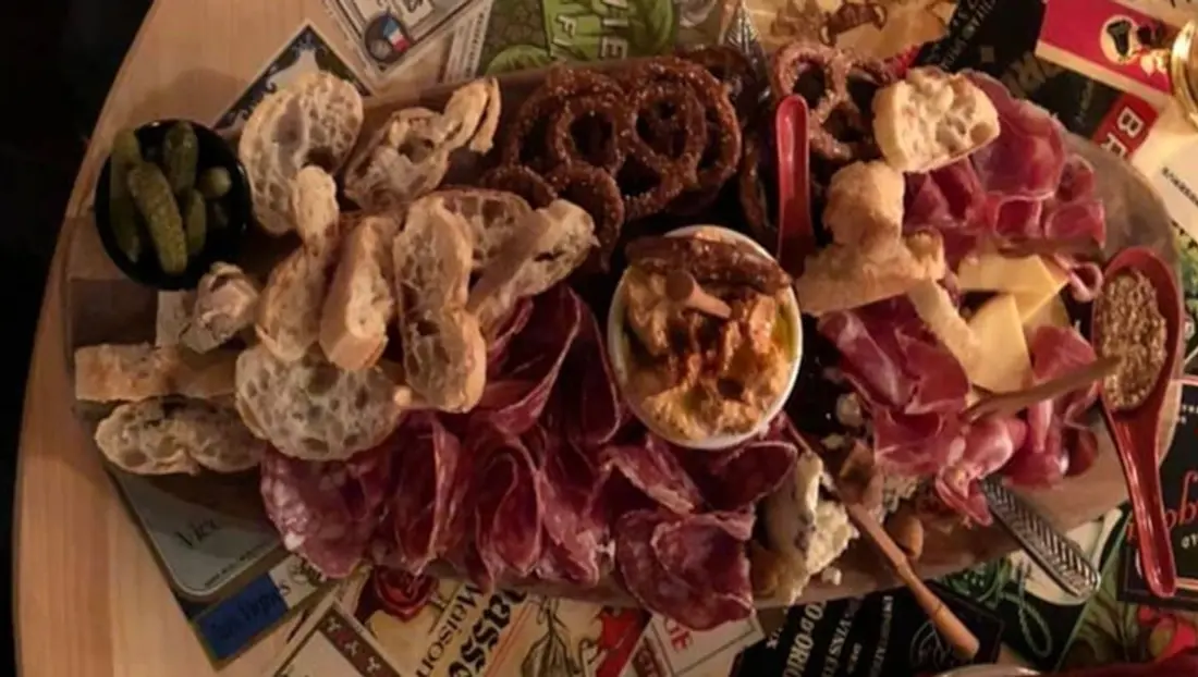 Board 4 with smoked gouda, capicola, gorgonzola, soppressata, hummus and sourdough pretzels