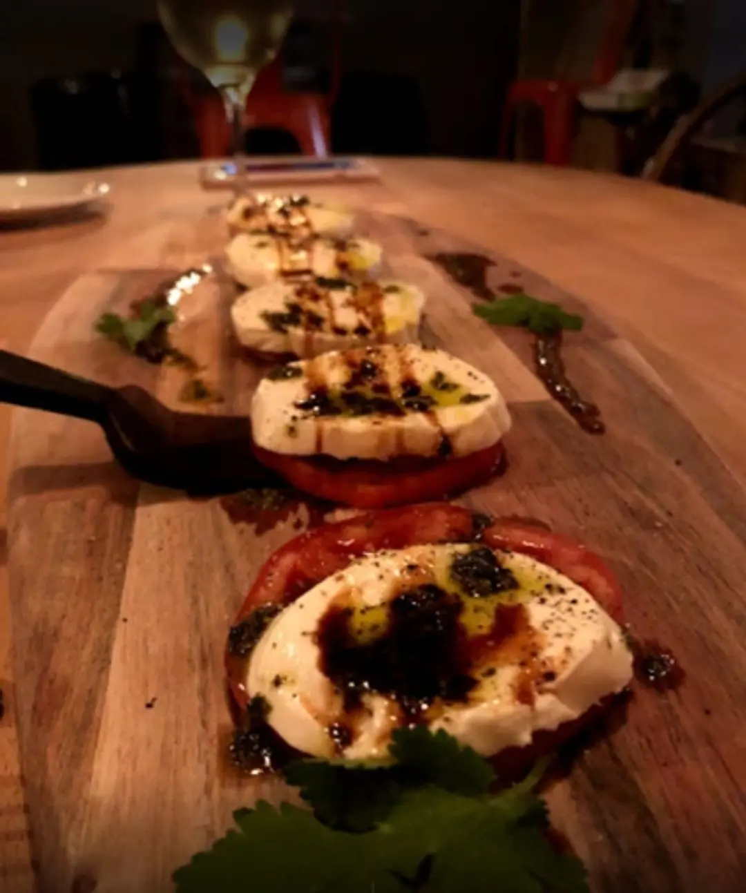 Lampone Insalata Caprese with mozzarella, tomato, raspberry balsamic and basil