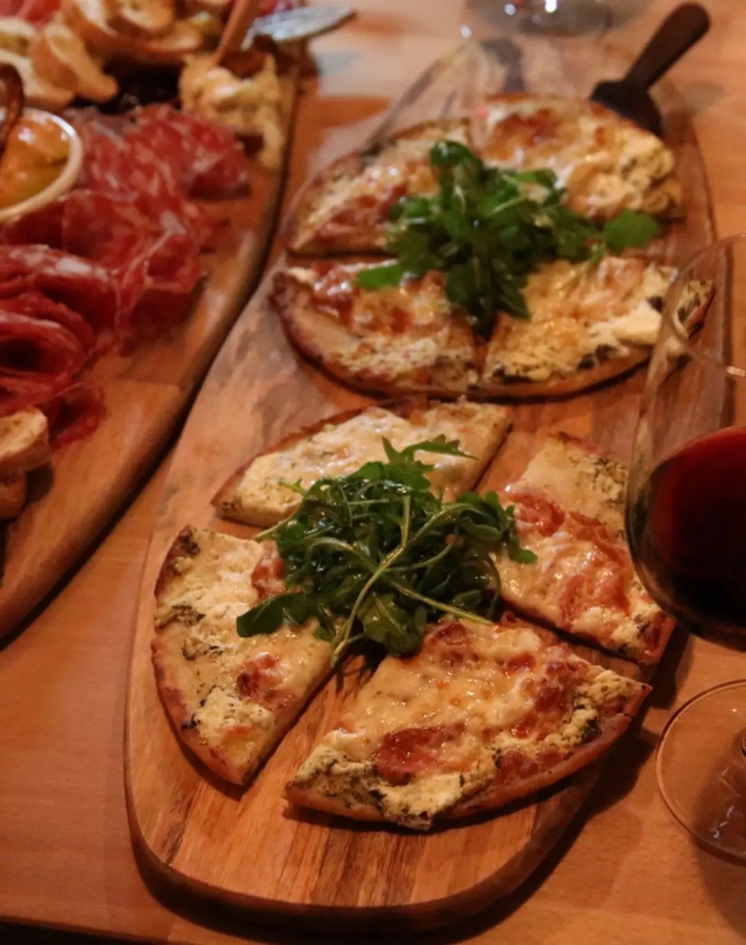 Prosciutto Piadina flatbread with prosciutto, goat cheese, mozzarella and greens