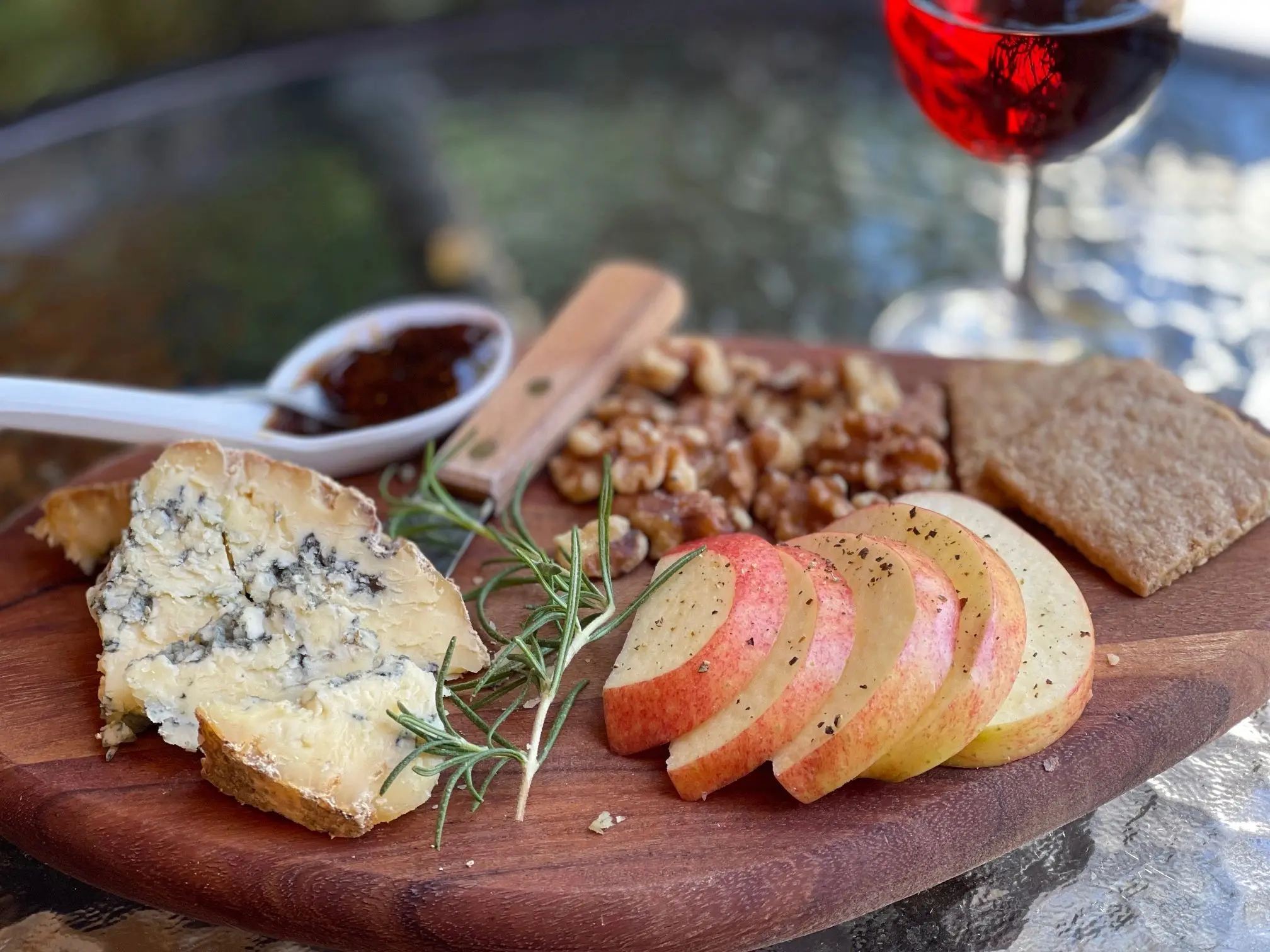Stilton cheese wedge with accompaniments